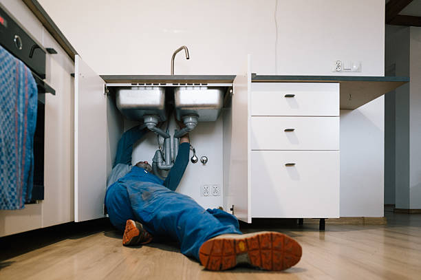 Professional Drain Cleaning technician working in Ashby, MA